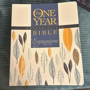 One Year Chronological Bible Expressions by Tyndale, paperback.